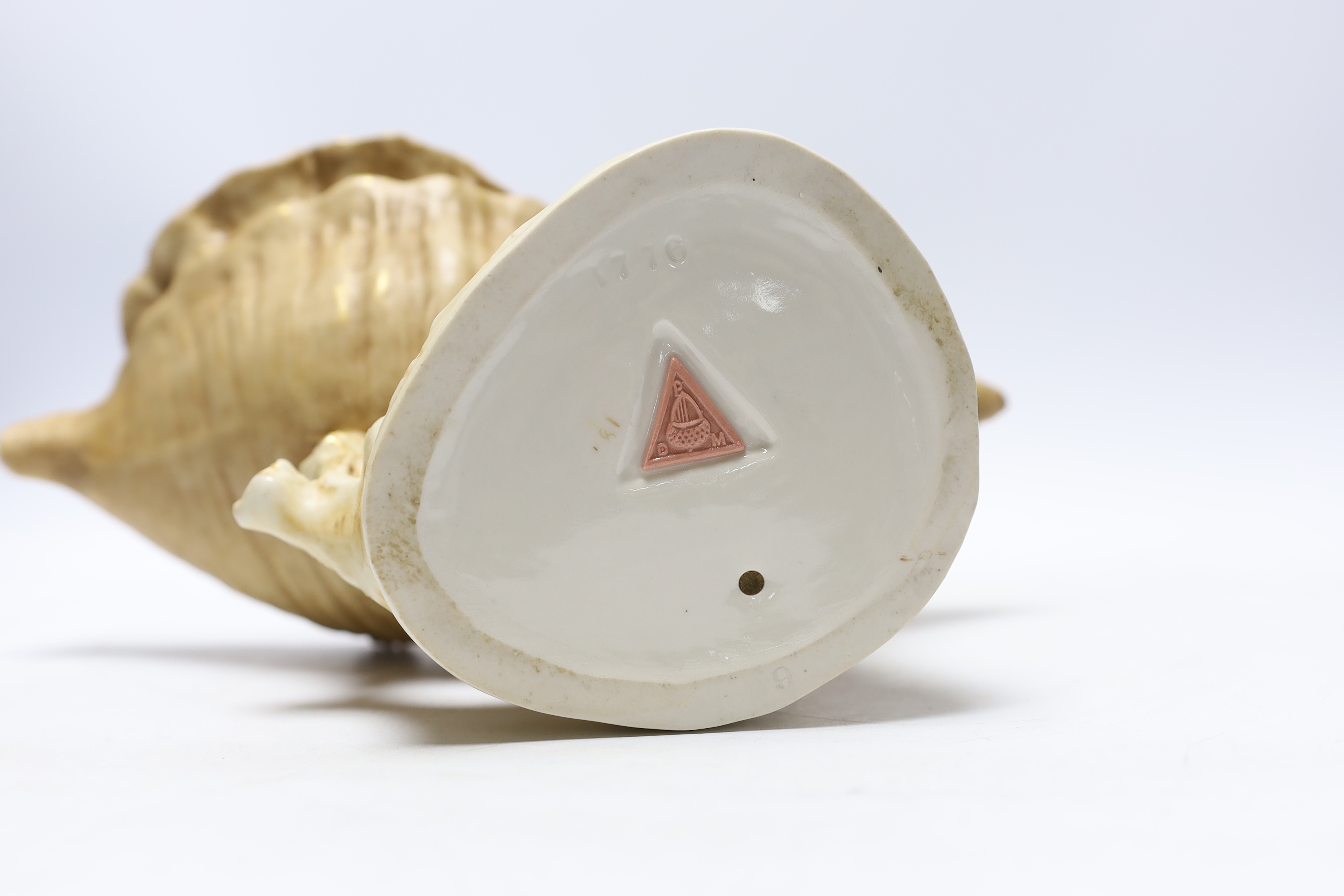 A Royal Dux shell girl and shell centrepiece, 30cm wide x 33cm high